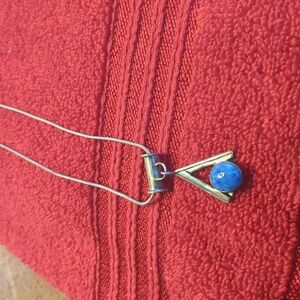 Necklace with blue stone